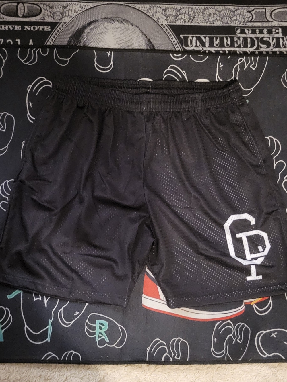 Men's Black Athletic Mesh Shorts with White Logo Accent